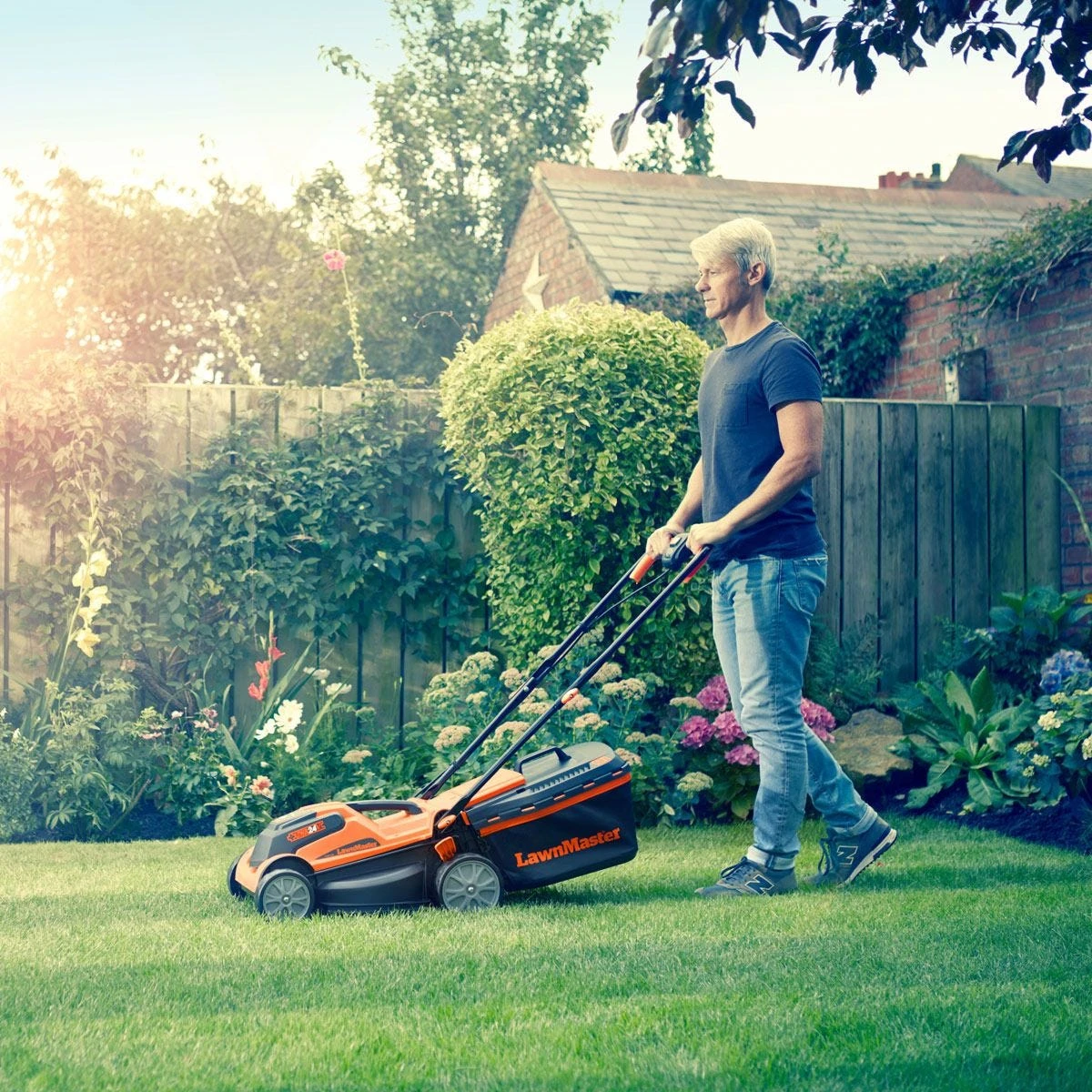LawnMaster MX 24V 34cm Cordless Lawnmower And Grass Trimmer Set With 2 Battery Packs - Image 3